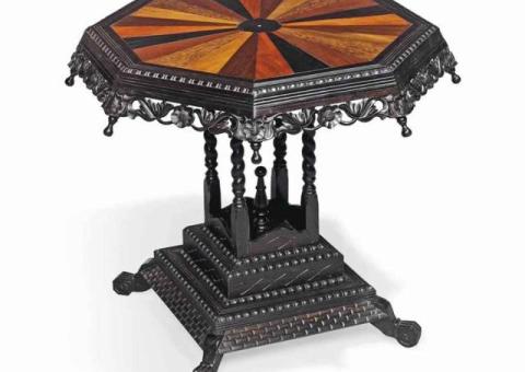 AN ANGLO-INDIAN EBONY AND SPECIMEN WOOD OCTAGONAL CENTRE TABLE